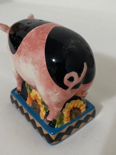 Pig salt Shaker with sunflower base. pink, blue, black and yellow